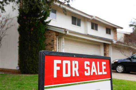 Should I buy a house now or wait? Experts weigh in on the current market